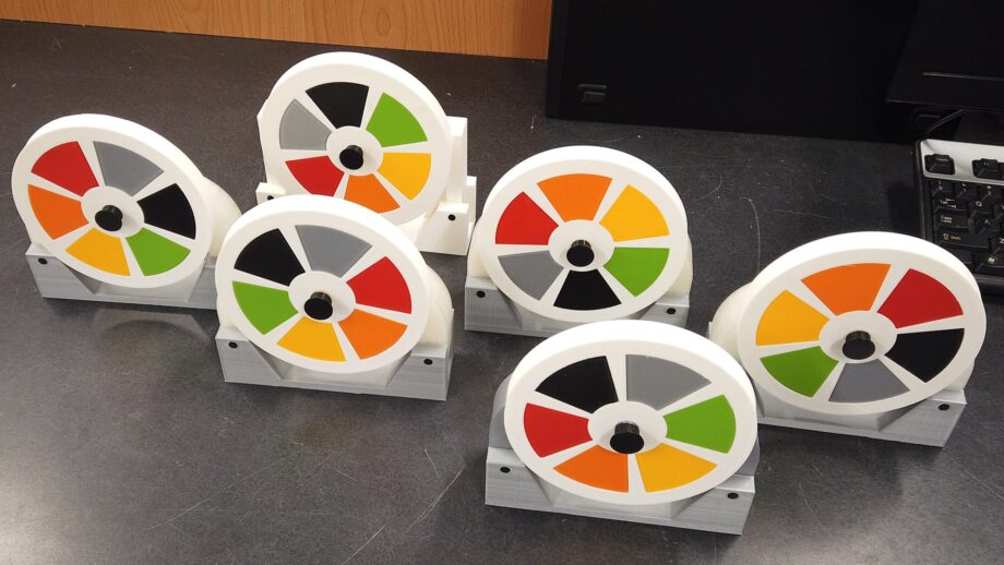 A set of 6 identical 3D printed sensory 'fidget' wheels.