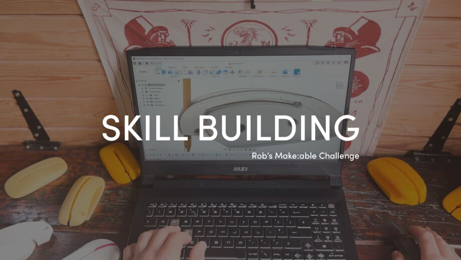 A laptop showing the 3d cad model of an assistive writing aid, with the title 'Skill Building' overlaid in white bold text.