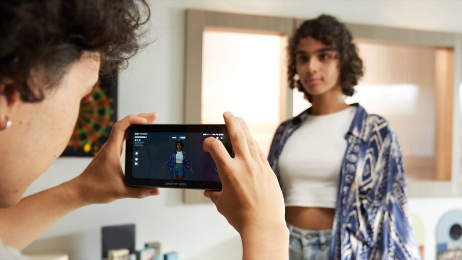 The Einstar Vega being used to scan a person stood up in a room.