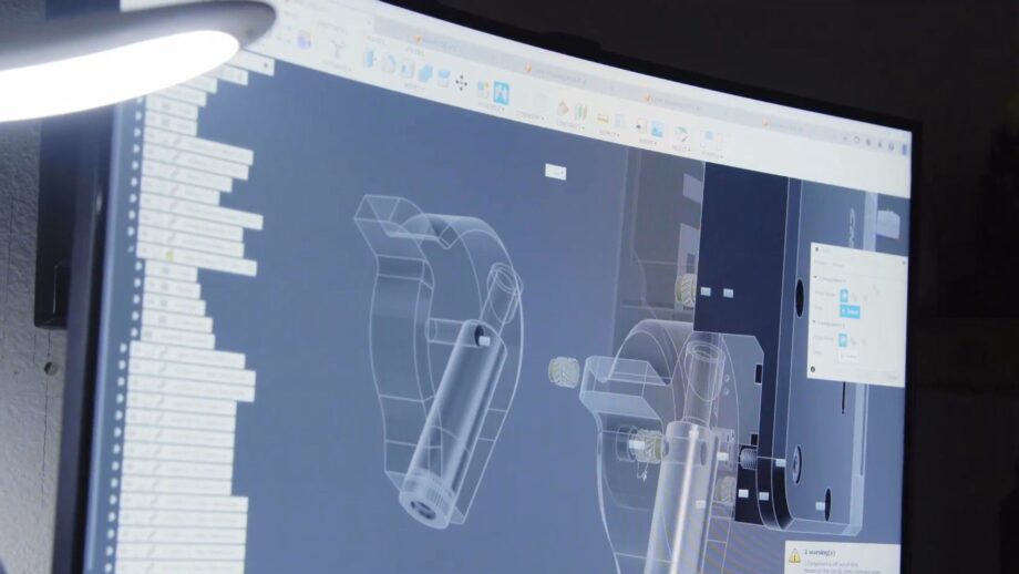 A computer screen showing a mechanical design in Autodesk Fusion.